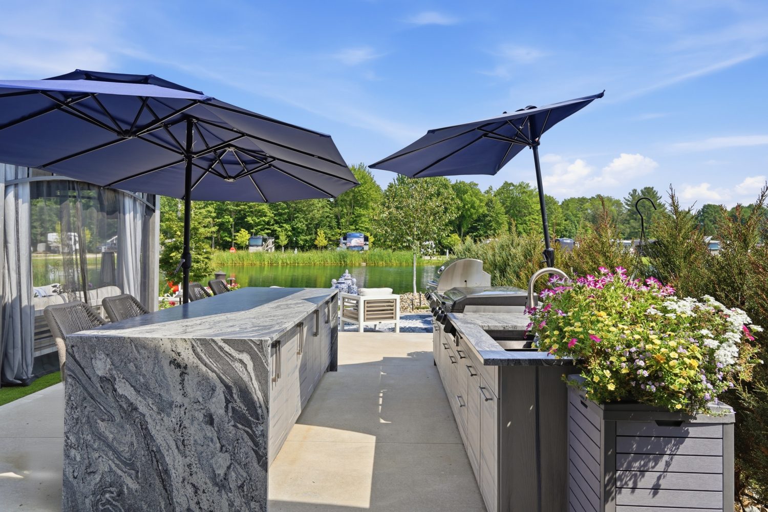 Built-in grill and griddle set into a granite island